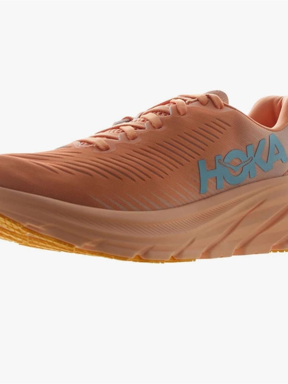Hoka Peach Running Shoe with Light Blue Logo and Yellow Outsole